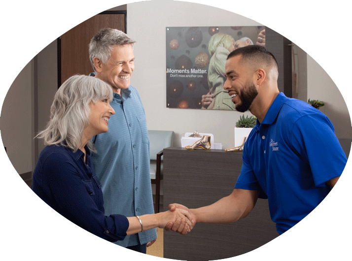 Good Feet employee shaking hands with Client